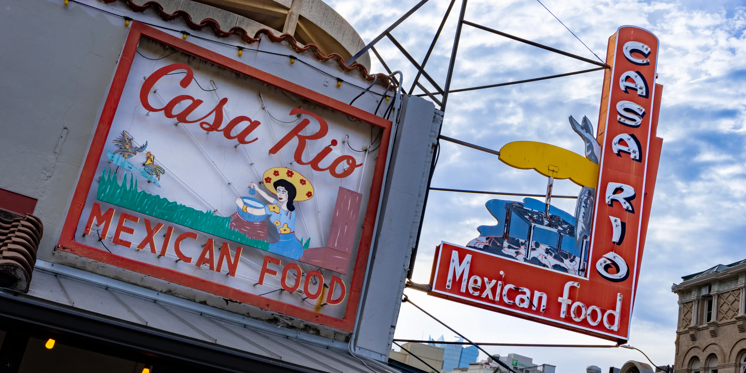 The neon Casa Rio Mexican Food signs on the San Antonio River Walk
