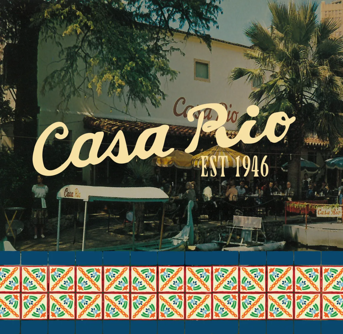 Archival photograph of the Casa Rio patio with the vintage script sign